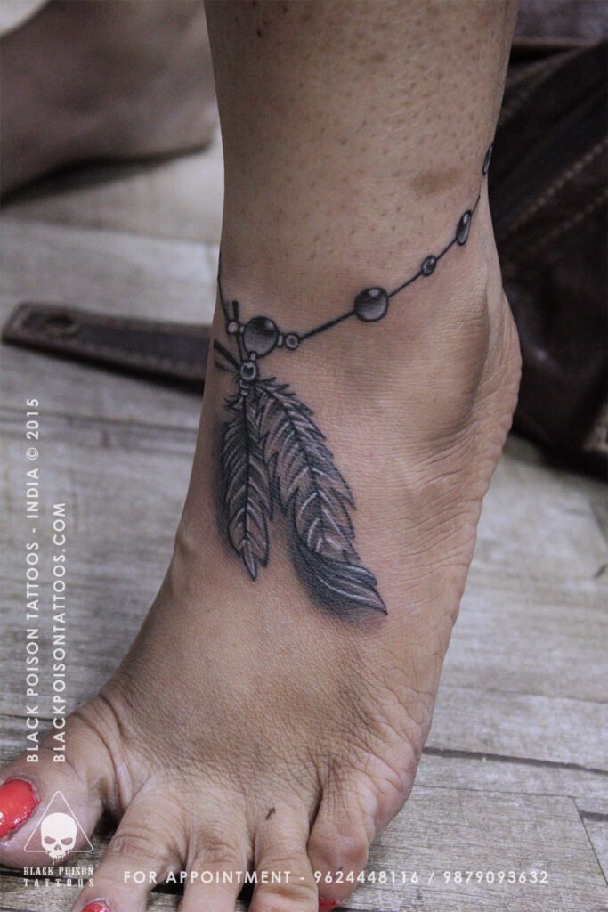Anlet Tattoo With Feather