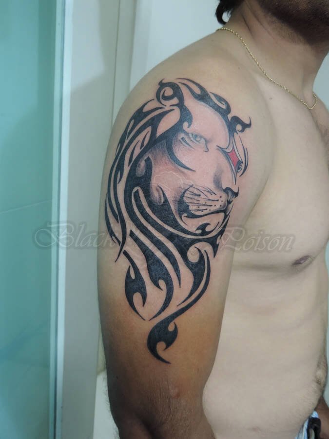 Lion Tattoo on Shoulder in Blackwork tattoo Style