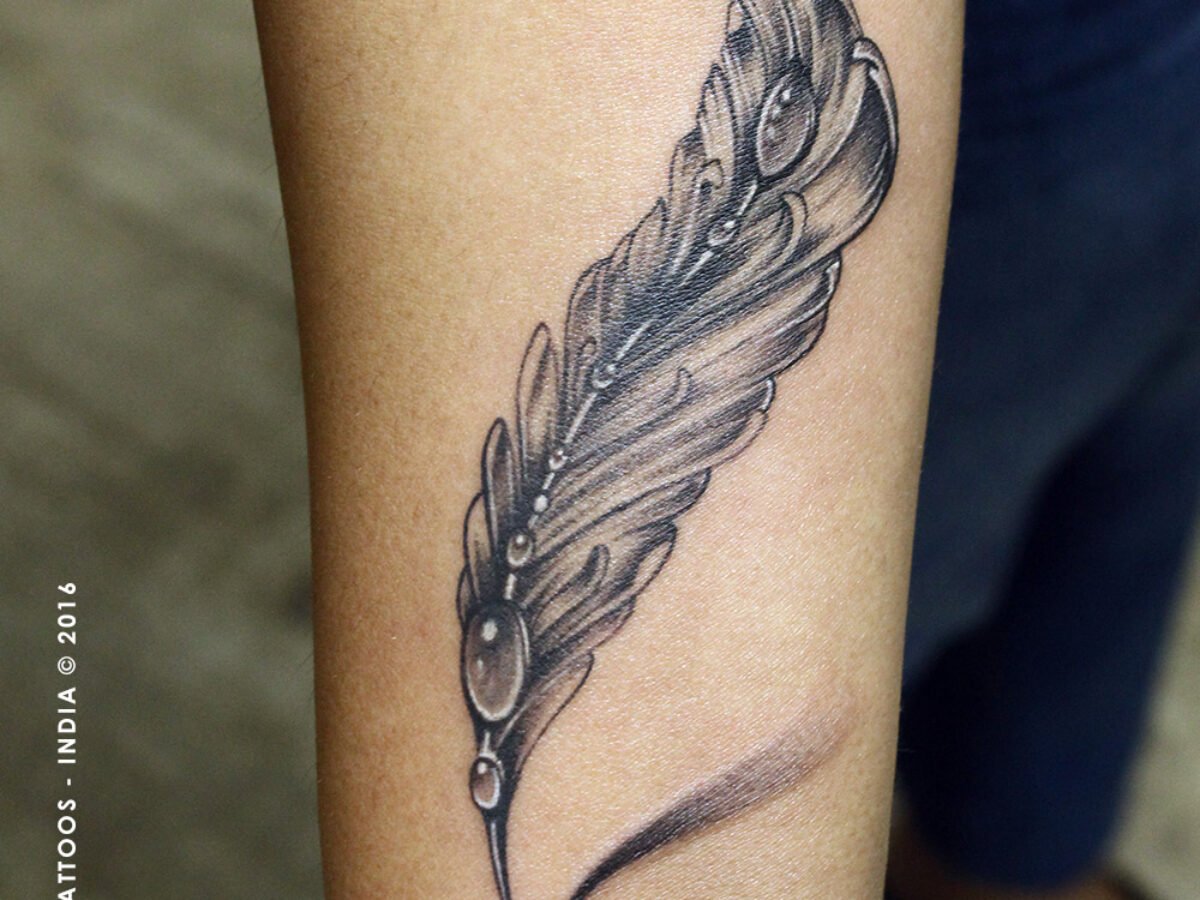 Feather Arm Tattoos 52 Beautiful Feather Tattoos With Meaning Our