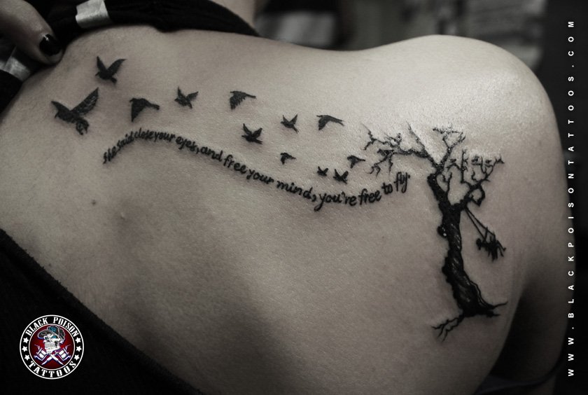 Tattoo of Flying Birds from Tree with Quotes