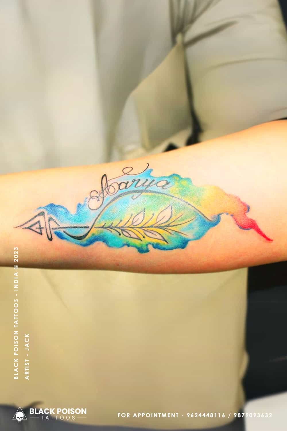 A Watercolor Flight Unveiling the Beauty of the Arrow and Name Aarya Tattoo