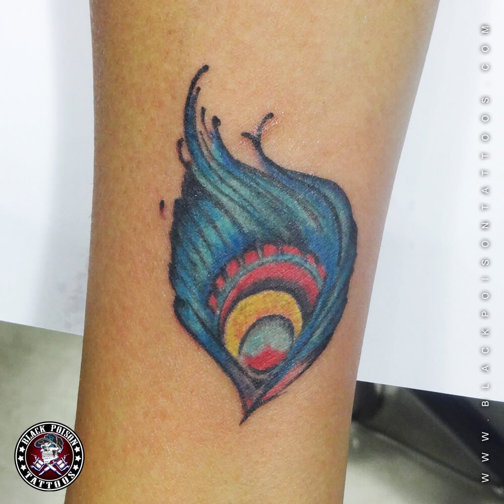 Peacock feather tattoo for #women hand #permanent #Tattoo design peacock # feather with #flute music tattoo #Prince tattoo studio Raipur… | Instagram