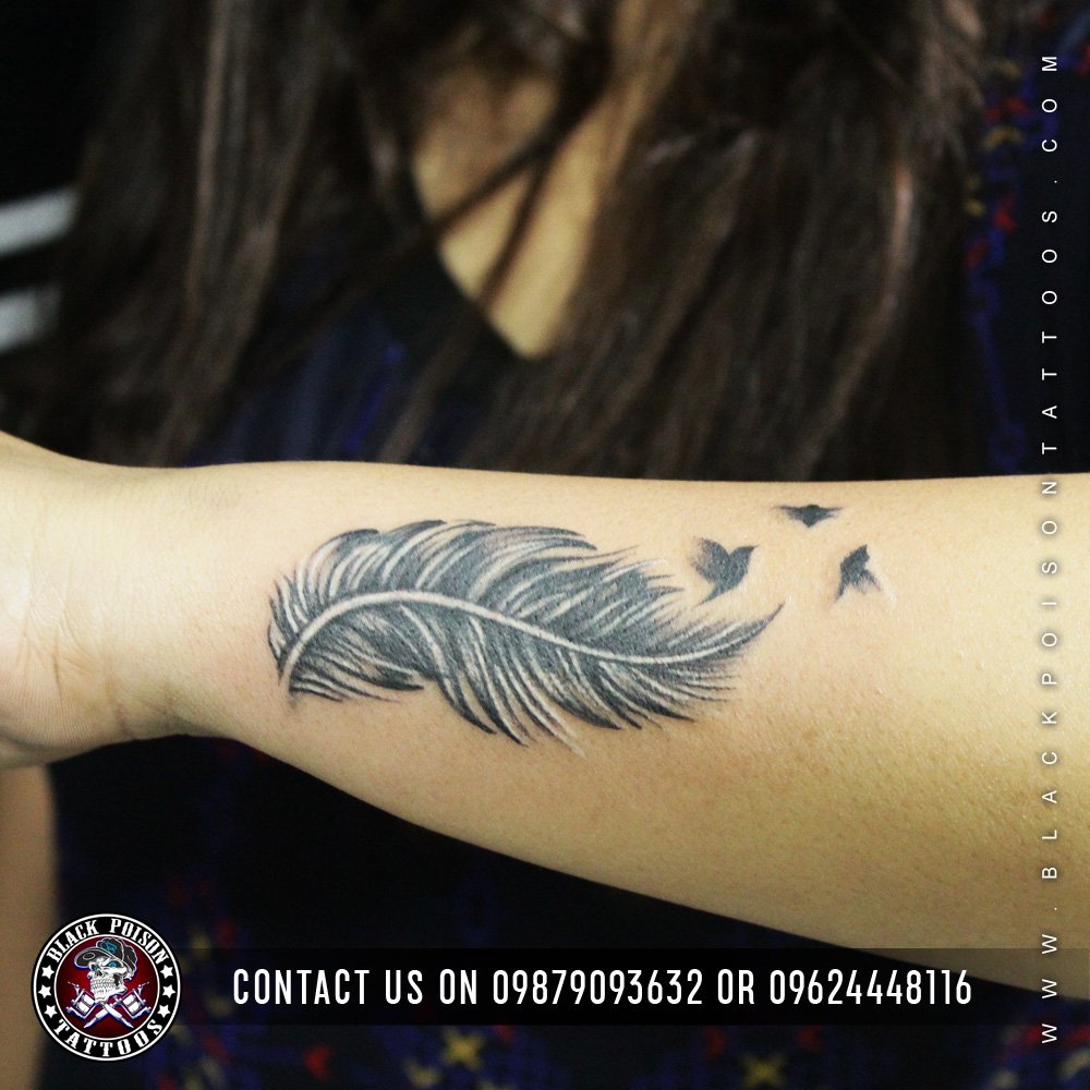 Feather Tattoo With Birds Flying Out Meaning