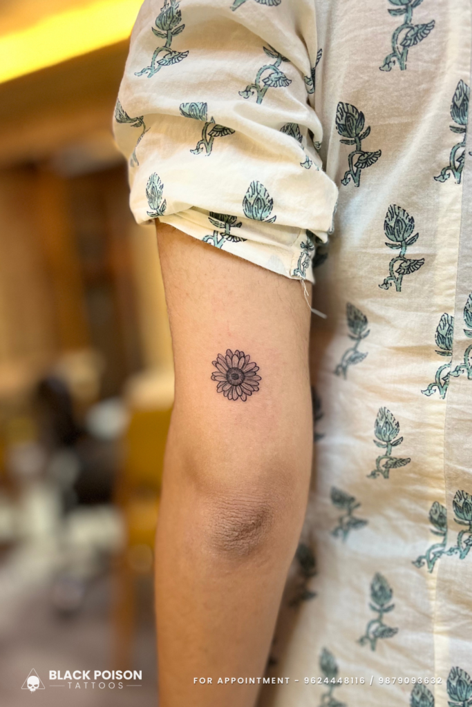 Small Flower Tattoos: Symbolism and Beauty in Delicate Designs