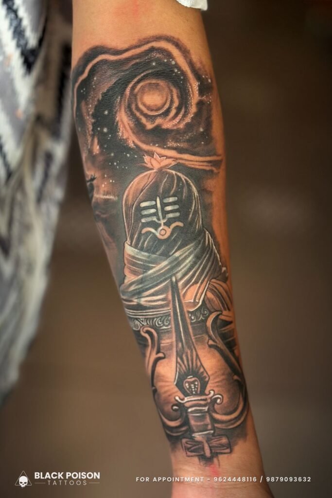 Shiva Lingam tattoo with cosmic design