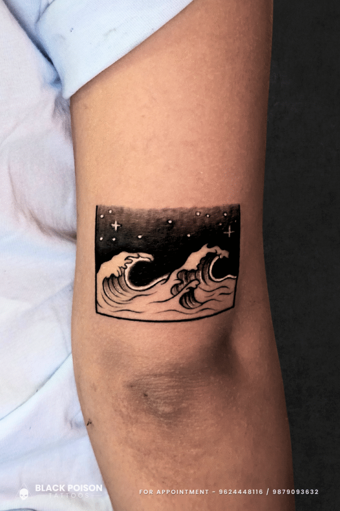 Minimalist Night Sky Ocean Waves Tattoo on Arm