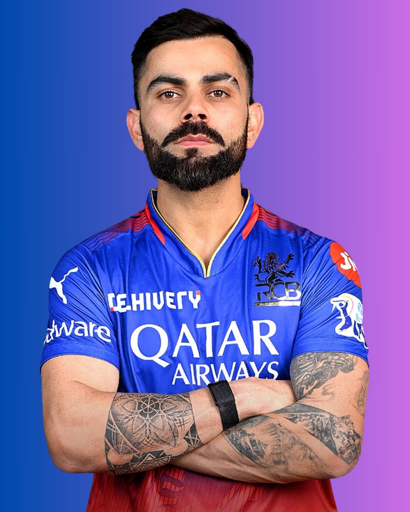 Virat Kohli with both arms crossed, showcasing a collection of detailed tattoos on his forearms