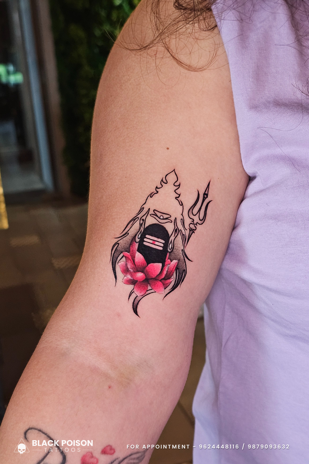 Shiva lotus minimal line art tattoo on upper arm in Ahmedabad