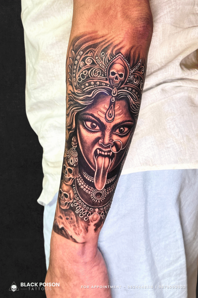 Realistic Kali Ma tattoo on forearm by Black Poison Tattoos Ahmedabad
