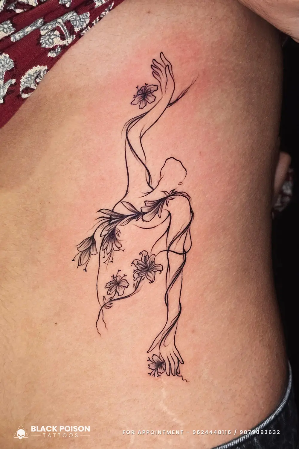 Delicate fine line tattoo of an abstract human figure intertwined with lilies and floral elements on the side rib cage.