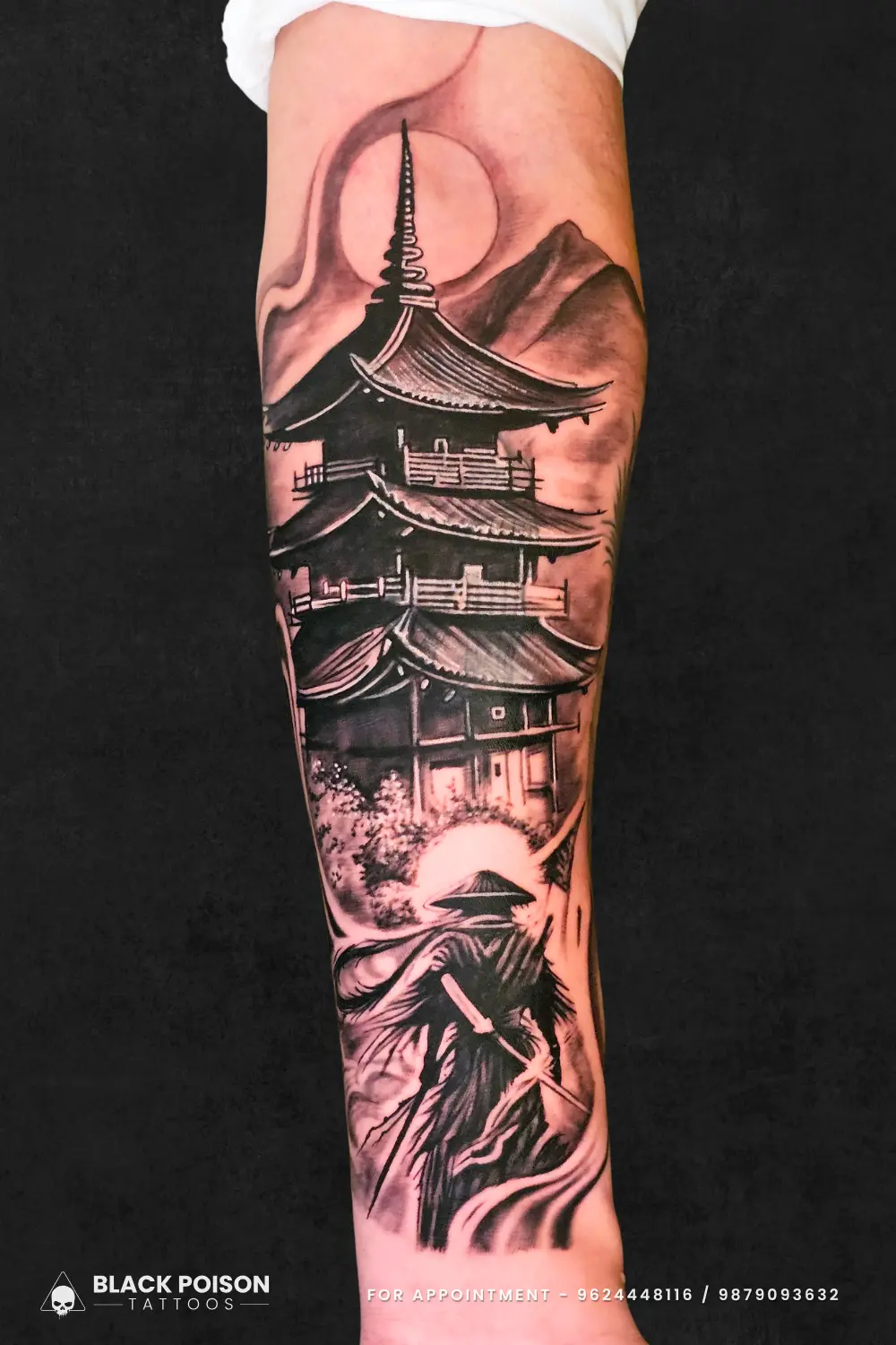 Detailed black and grey realism tattoo of a samurai warrior standing before a traditional Japanese pagoda on a forearm by Black Poison Tattoo Studio Ahmedabad.