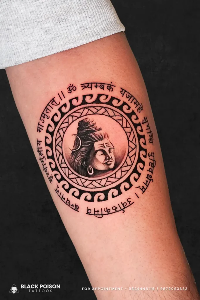 Detailed Lord Shiva portrait tattoo with Mahamrityunjaya Mantra in circular Sanskrit script by Black Poison Tattoo Studio Ahmedabad.