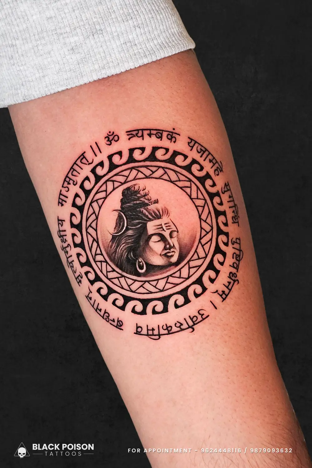 Detailed Lord Shiva portrait tattoo with Mahamrityunjaya Mantra in circular Sanskrit script by Black Poison Tattoo Studio Ahmedabad.