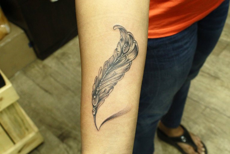 Beautiful Simple & Subtle Feather Tattoo - Inked By Black Poison Tattoo Studio
