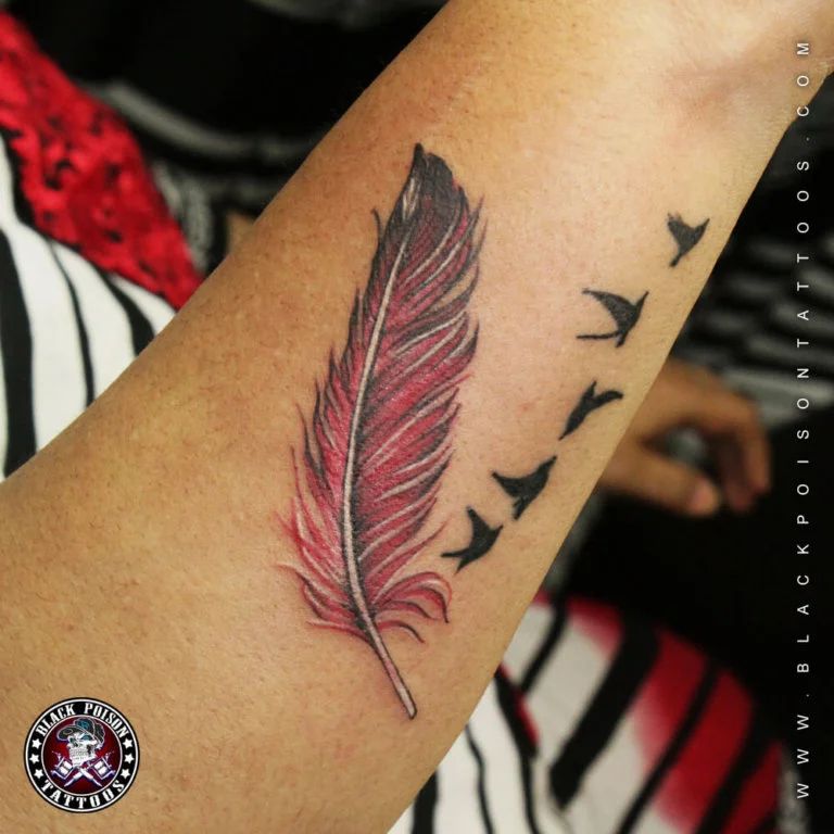 feather with bird tattoo