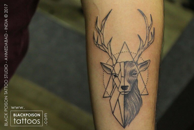 Geometric stag head tattoo on the leg
