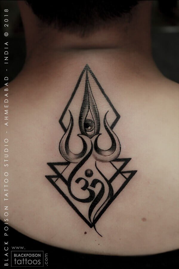 Geometric Trishul and Om tattoo with triangle linework on the upper back by Black Poison Tattoo Studio Ahmedabad