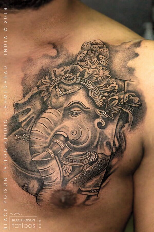 Black and grey Ganesha chest tattoo