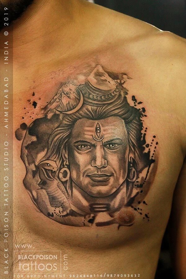 Black and grey Lord Shiva portrait tattoo on the chest