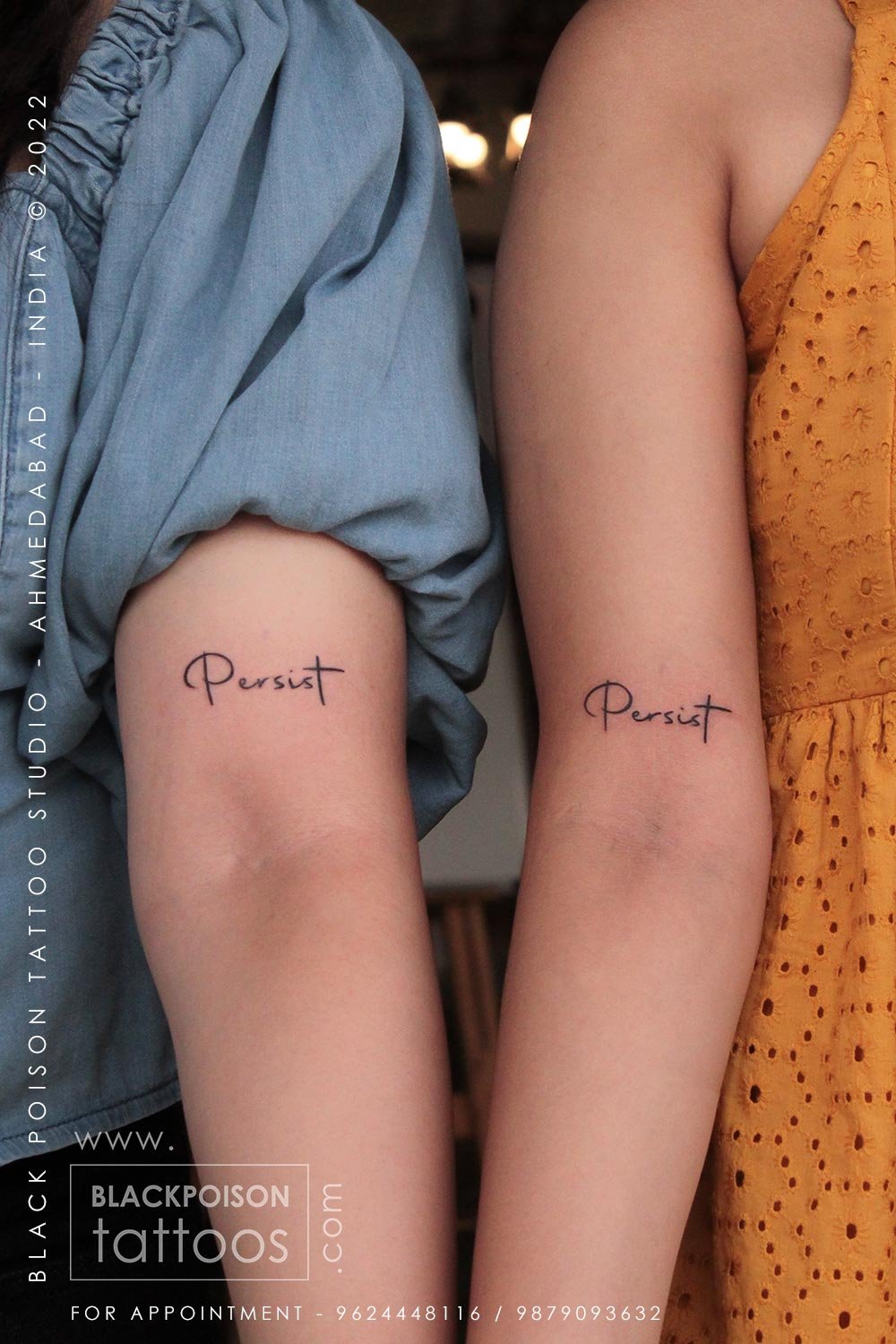 Matching script tattoos reading pursuit on two arms