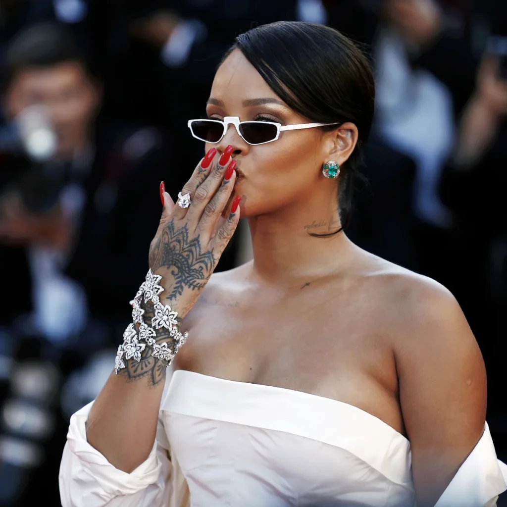 Rihanna showing the ornamental tattoo across her hand