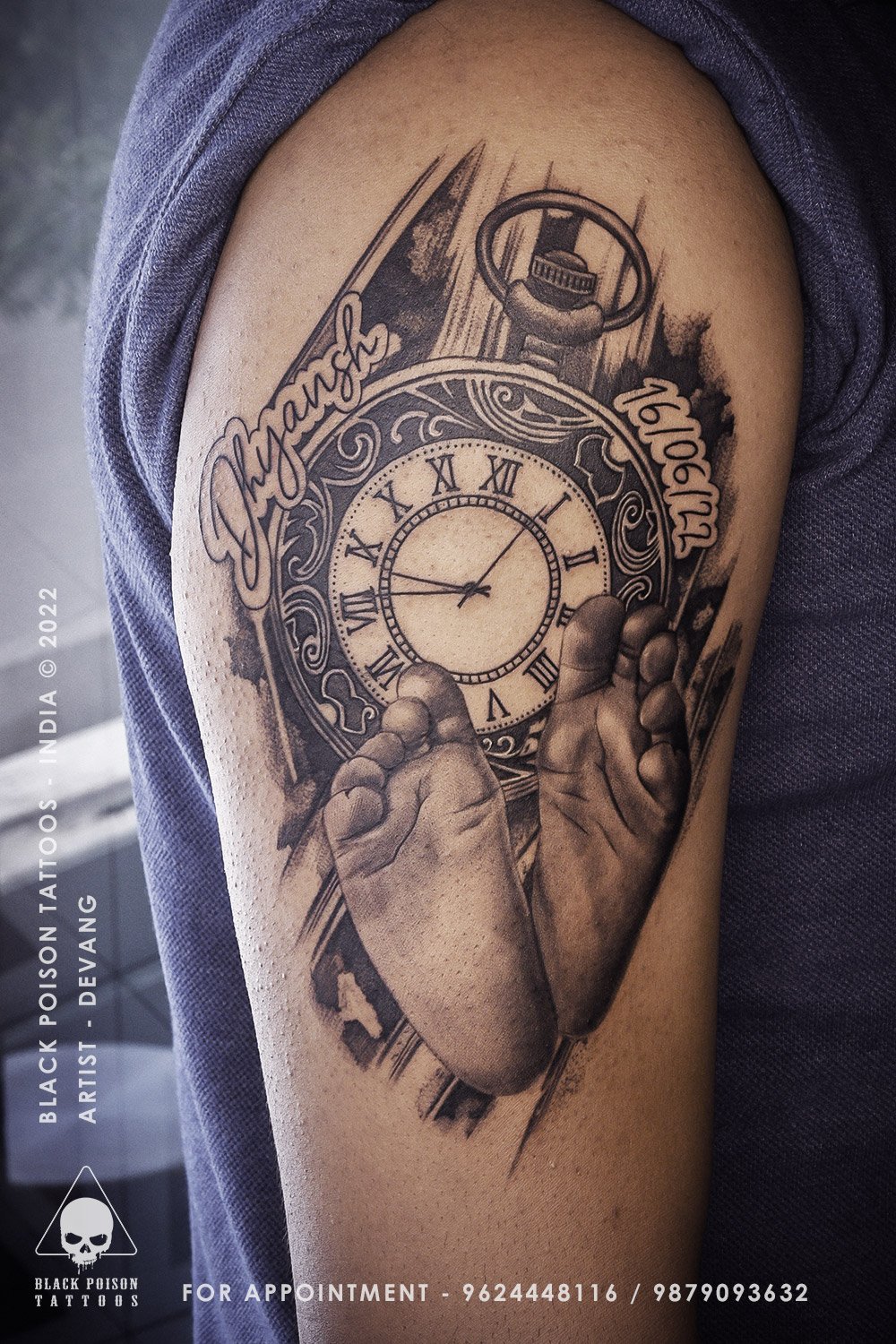 Black and grey tattoo of hands holding a pocket watch with roses on the upper arm