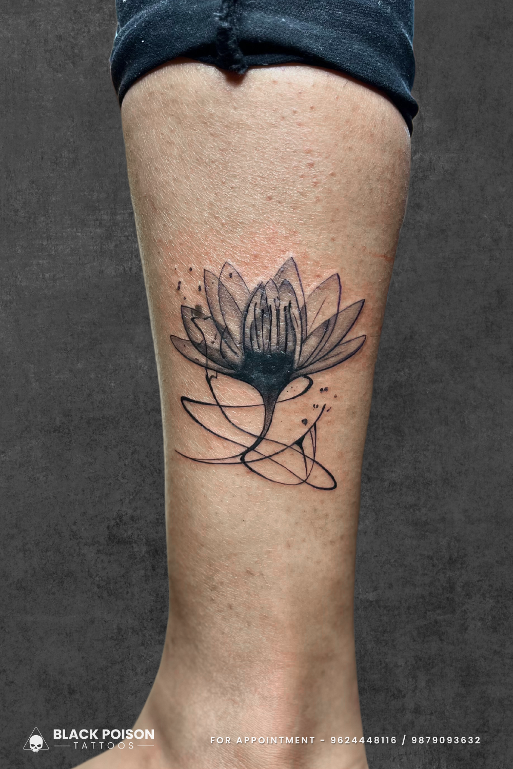 Fine line lotus tattoo with geometric accents on the calf