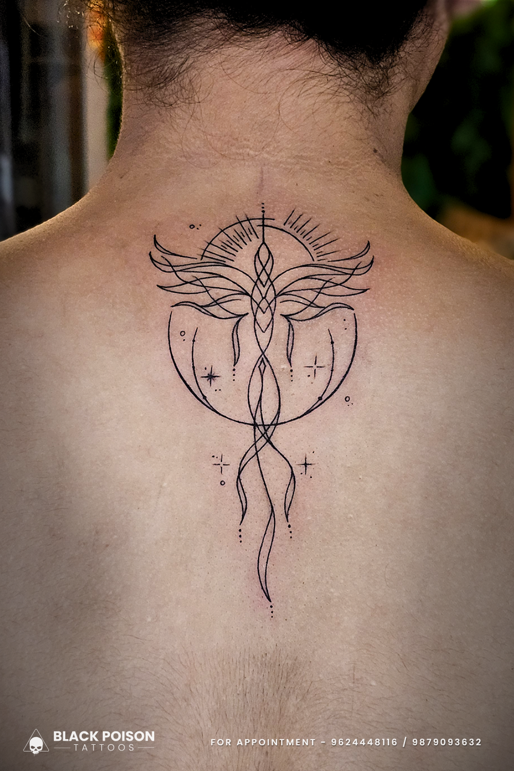 Geometric Phoenix Tattoo on Upper Back