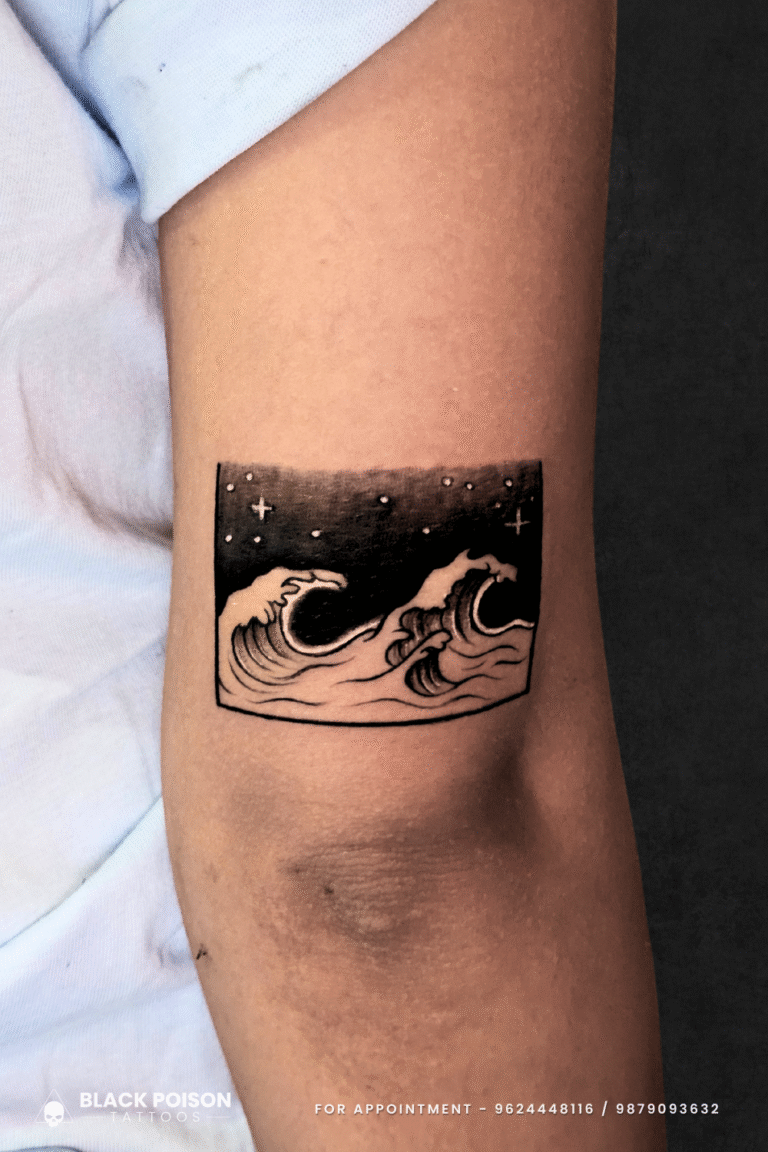 Minimalist Night Sky Ocean Waves Tattoo on Arm