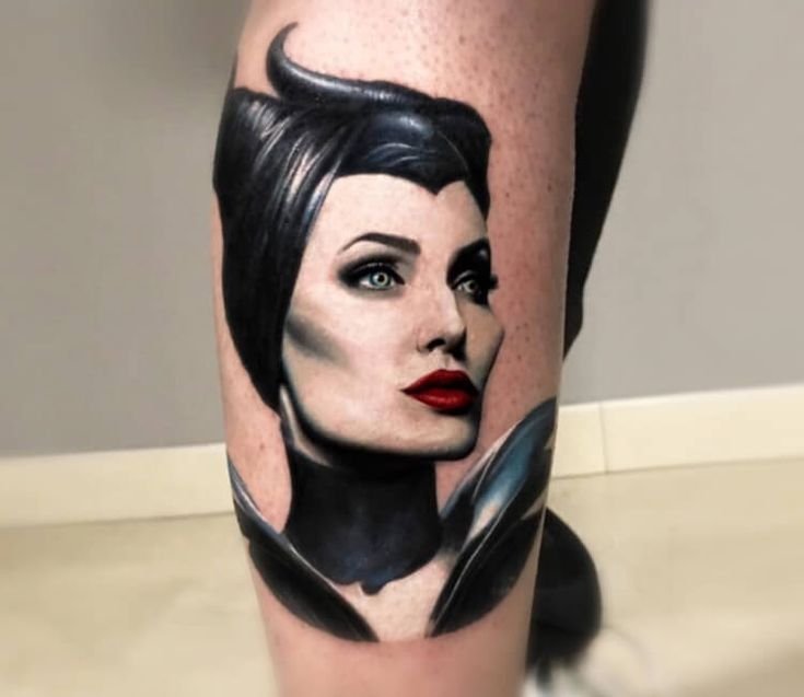 Close up realistic Maleficent portrait tattoo with red lips